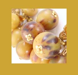 Marbled Bakelite Beads and Brass Necklace Close