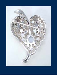 Leo Glass Rhinestone and Glass Cabochon Leaf Brooch Signature