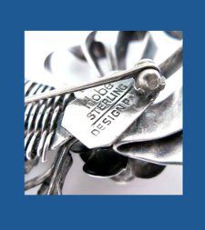 Hobe Sterling Flower Basket Pin Signature